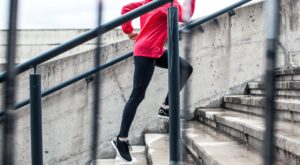 a woman running up stairs