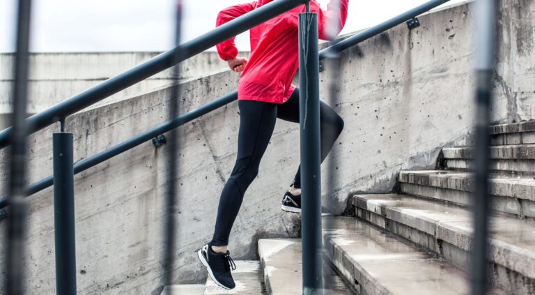 a woman running up stairs